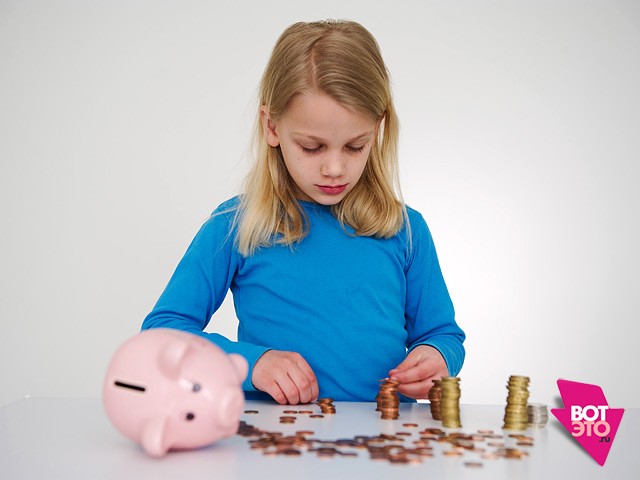 Girl and slaughted piggy bank